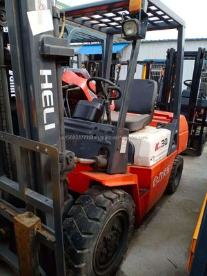 Tiendas de materiales de construcción TCM Heli K30 carretilla elevadora con y gran rendimiento máquina usada