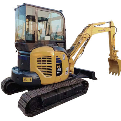 Mini excavadora Komatsu PC35 de segunda mano con 11,2kw de potencia y 0,2M3 de capacidad de cubo